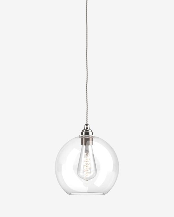 The Hereford Pendant Light features an extremely versatile glass globe shade and is shown here in clear glass