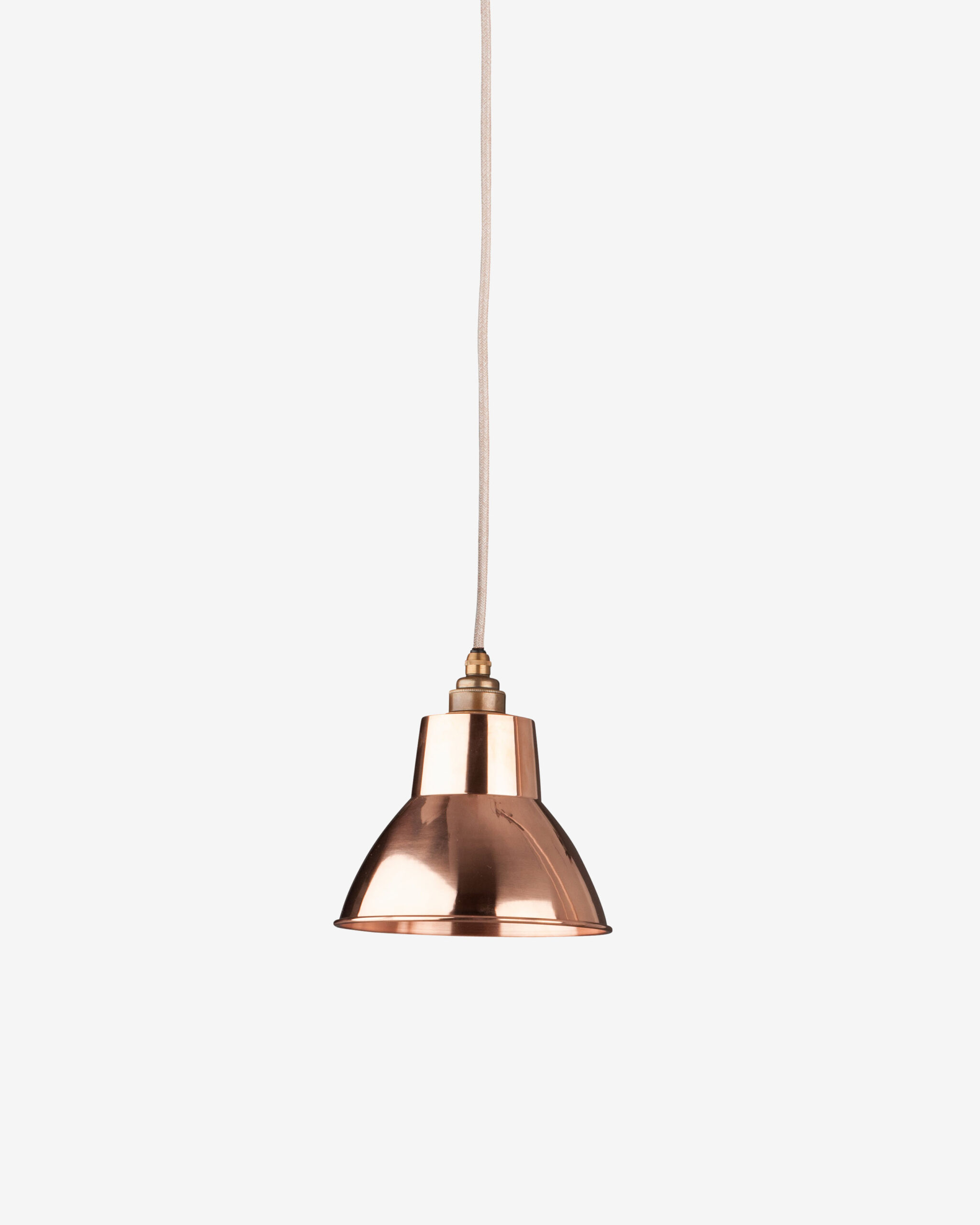 Moccas Industrial Pendant Light is shown here with a copper shade, but comes in a variety of finishes.