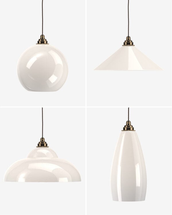 A mixture of white glass pendant lights by Fritz Fryer Lighting