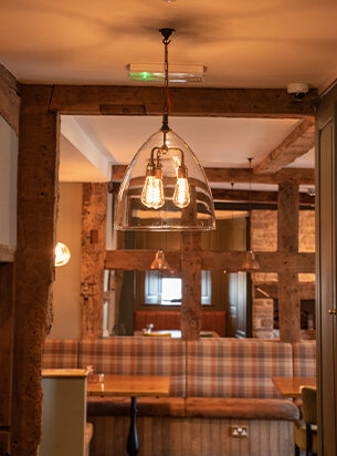 This large Ledbury lantern with clear glass and 3 sources of light demonstrates the impace hotel ceiling lights can have.