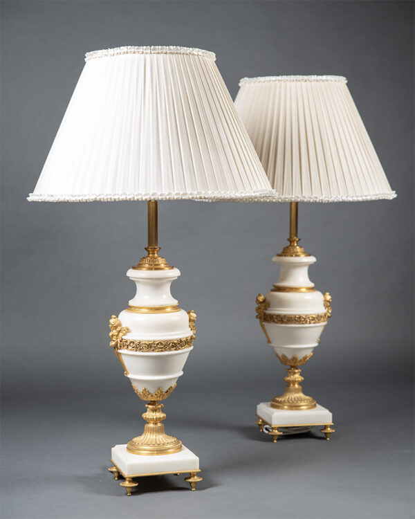 Pair of marble table lamps with cream fabric shades