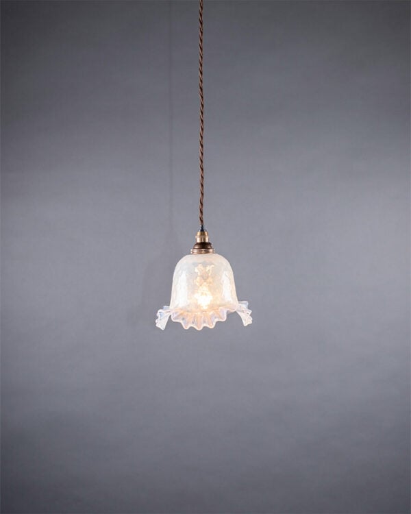 Eau De Nil pendant lights with frilled design.
