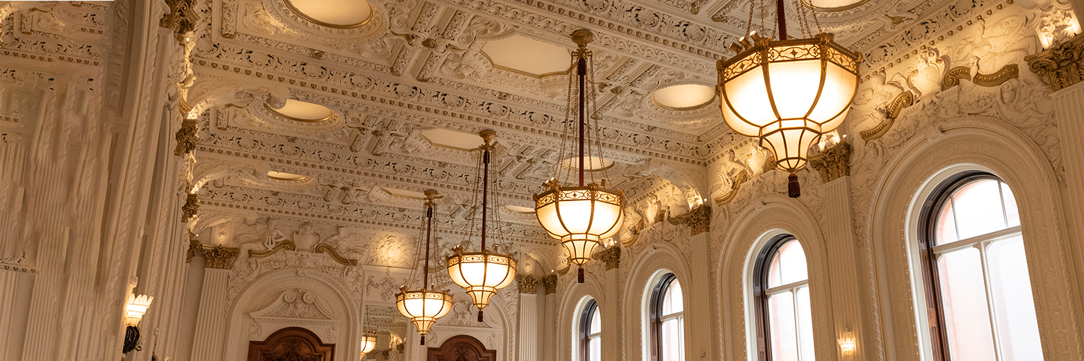 Grand Hotel Birmingham's antique lighting enhances the Louis XIV-style grand ballroom, creating a magnetic atmosphere.