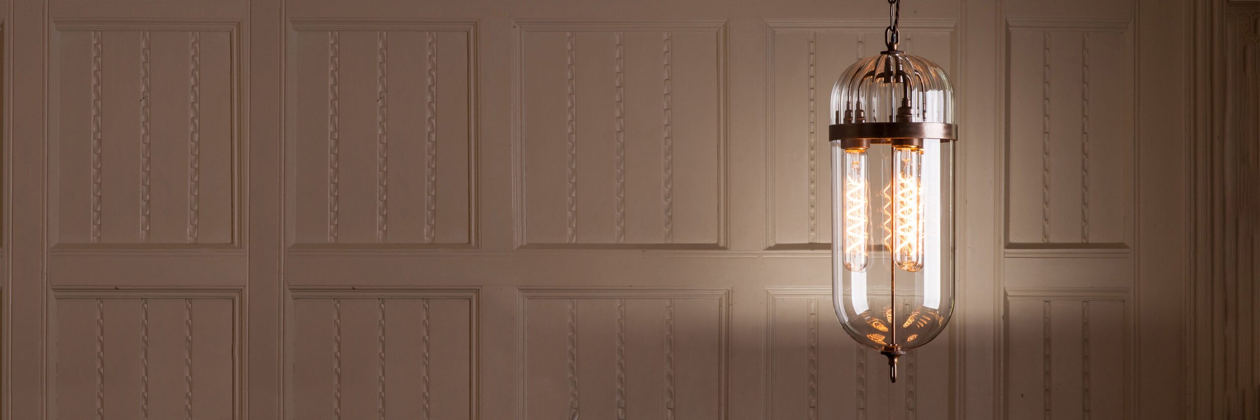 The Aston ribbed top and clear glass bottom lantern, a popular choice from the Aston lighting collection.